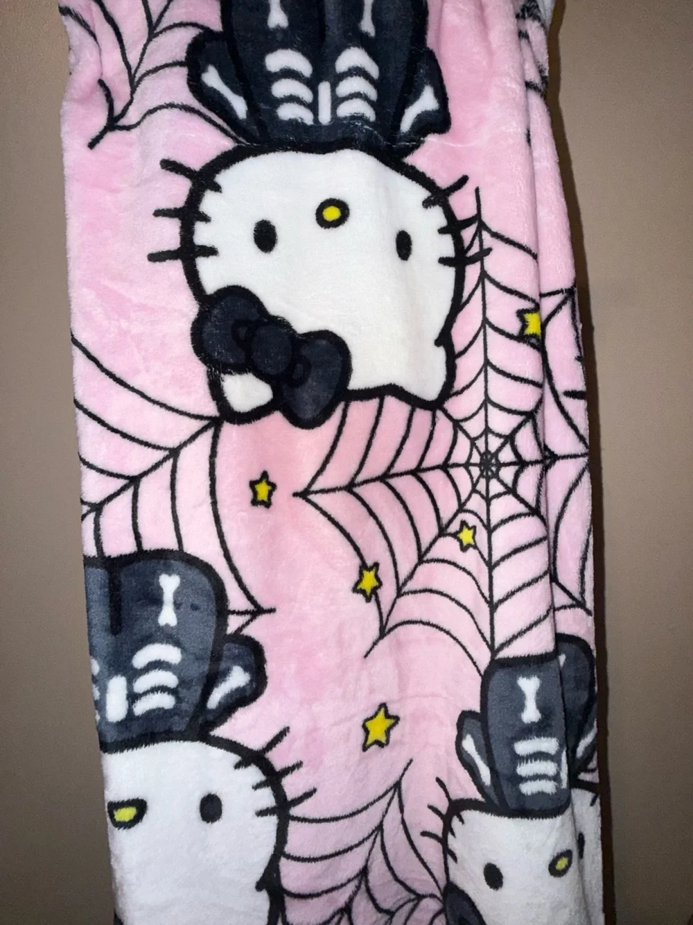 Hello Kitty Pink Plush Halloween Throw with Black Skeleton Motif